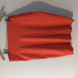 Super dope orange skirt!
